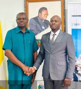 L-r: Professor Martin Osita Anagboso, deputy vice chancellor, Madaonna University in a handshake with Rock Adote, newly appointed member of the Board of Trustees of the University