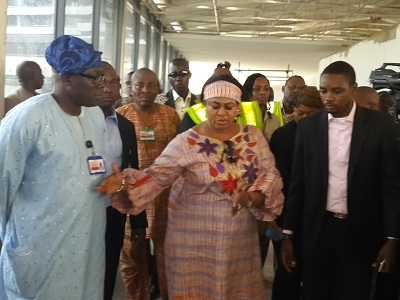 picture: Princess Stella Oduah, minister of Aviation flanked by officials of the ministry and FAAN while on an inspection tour of MMIA 'D' and 'E' fingers in Lagos on Tuesday.