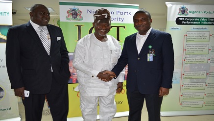 (L-r): Ismail Hussein, deputy chairman, House of Representative Committee on Emergencies and Disaster Preparedness, Ifedayo Abegunde, chairman of committee in a warm handshake with Engr David Omonibeke ,Executive Director Marine and Operations Nigerian Ports Authority who  represented  Malam Habib Abdullahi, managing director, Nigerian Ports Authority (NPA) at the visit of the committee to the NPA HQ MARINA.