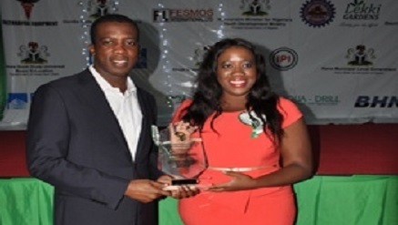 (L-r): Chukwuma Ochonogor, managing director and chief executive officer, and Chidinma Onyeokoro, head, Strategy and Marketing, both from Rosabon financial Services Limited, immediately after receiving “Quality Service Award” bestowed on the company by the Institute for Government Research, Leadership and Technology, Abuja, recently.