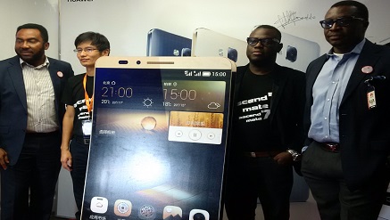 (L-r): Nnamdi Ezeigbo, MD/CEO, Slot Systems Limited, Yang Fufu, country manager, Huawei, Nigeria, Olaonipekun Okunowo, country marketing manager, Huawei Consumer Business in Nigeria and Alibaba, popular Nigerian comedian, at the launch of Huawei Ascend Mate7 in Lagos on Thursday.