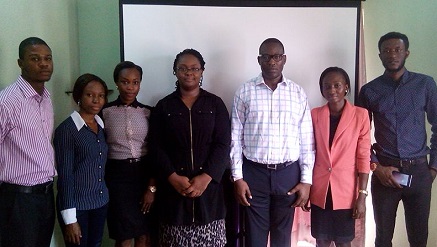 Martha Alade-Omoekpen, president of (WITIN), flanked by other partners