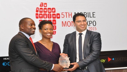 Ingenico group representative collecting the awards at Mobile Money Expo in Lagos