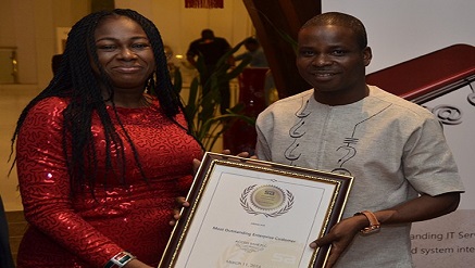 L-r: Adanma Onuegbu, CEO Signal Alliance, presenting award to AccessBank official