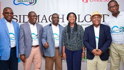 (L-r): Michael Olajide, executive director, Sales Market; Hassan Alao, executive director, Finance and Admin; Mr. Peter Arogundade, managing director; Chijioke Ekeh, chairman, all management staff of Sidmach Technologies Nigeria Limited; Oluwawemimo Adeniyi, director, Small Midmarket Solutions and Partners Group, Microsoft Nigeria, and Dr. Simpa Dania, Sabaoth Technologies Limited, during the launch of Sidmach Software Solutions in Lagos, recently.