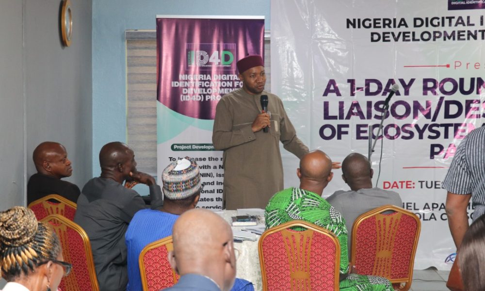 Dr. Walter Duru delivering a Paper on Duties of Desk Officers during the Roundtable